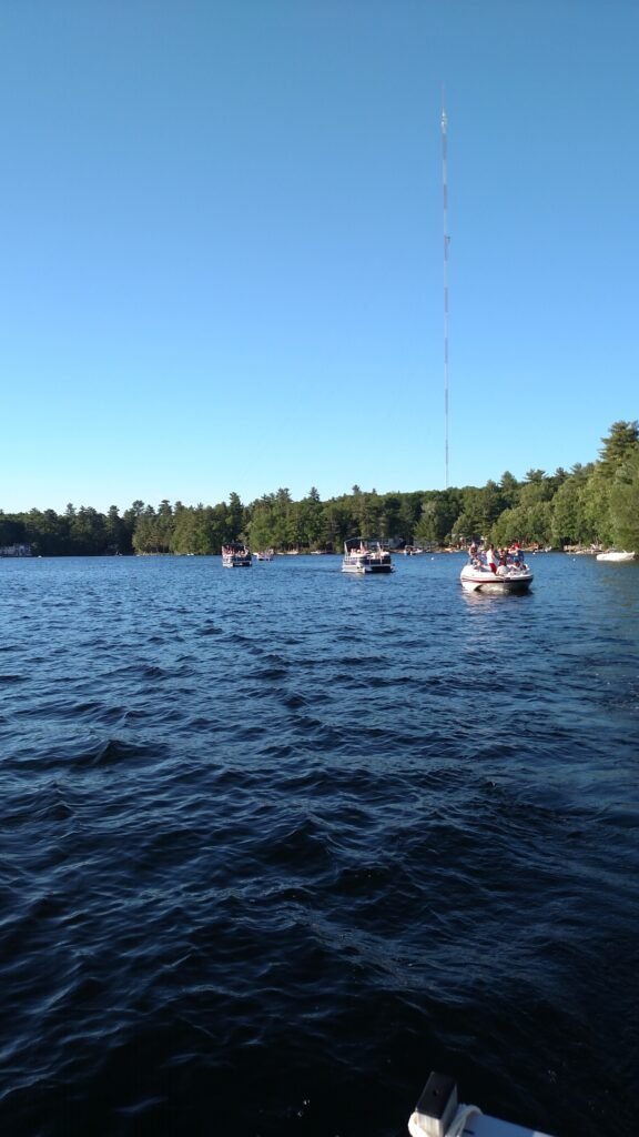 Boat parade on Thomas Pond