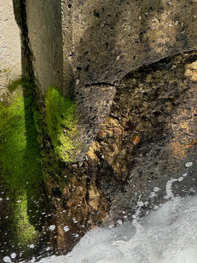Damaged corner of the dam