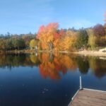 Fall foliage reflected on Thomas Pond