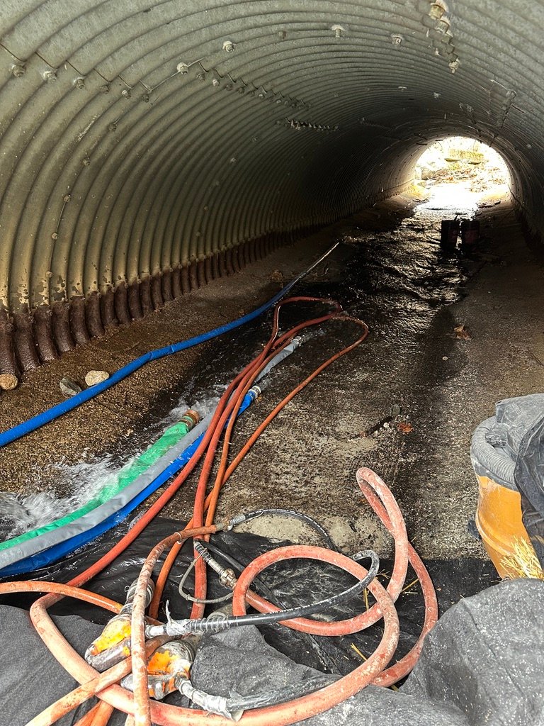 Water being pumped downstream from the dam